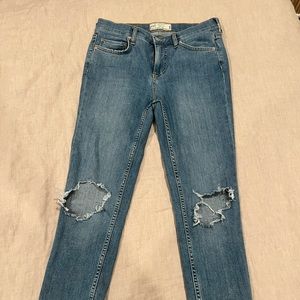 Free People skinny jeans with holes. Size 27.